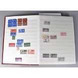 GB & Commonwealth large mint collection in red stock book, mostly KG VI - QE II, c. 800 stamps.