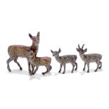 An early 20th century Austrian cold painted bronze deer and fawn group, 5.5 x 5.5cm, and two smaller