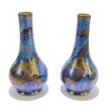 WEDGWOOD; a pair of lustre ware vases decorated with dragons, height 19cm (2).Additional