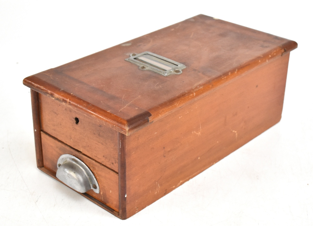 An early 20th century mahogany till box with hinged cover and single pull out drawer, length 40cm.