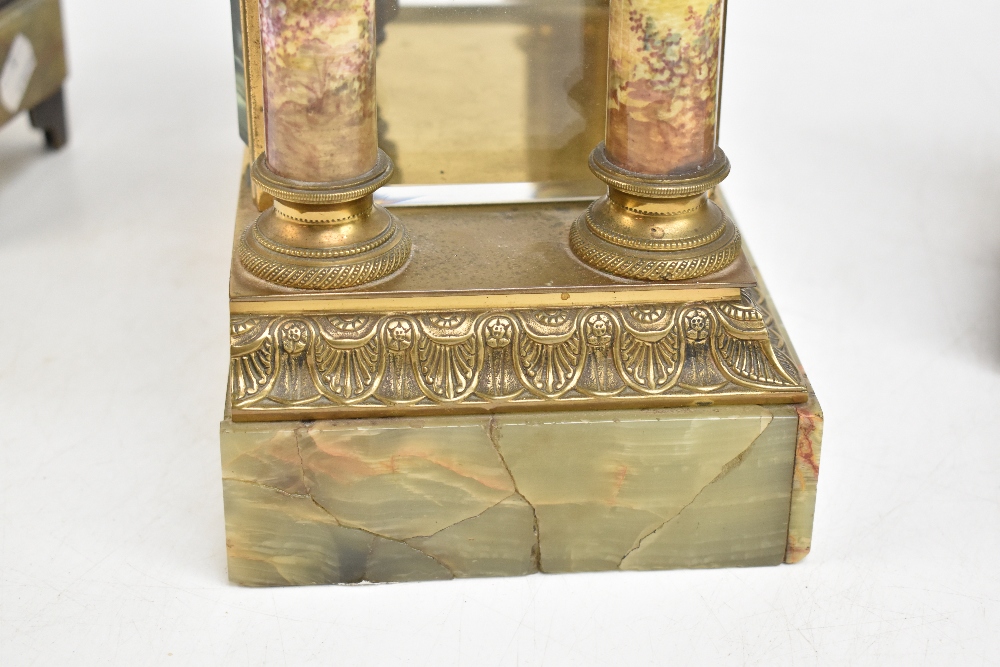 MARTI ET CIE; a late 19th century French onyx, gilt metal and porcelain mantel clock garniture, - Image 8 of 12