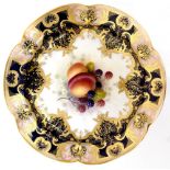 ROYAL WORCESTER; a bowl with lobed rim decorated by Albert Shuck,