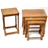 A nest of three oak side tables on turned supports to block feet, largest 45 x 49 x 34cm.