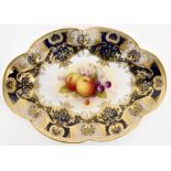 ROYAL WORCESTER; a cabinet display dish of oval shape and lobed rim,