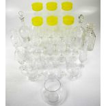 A quantity of cut glass and crystal drinking glasses to include champagne flutes, wine glasses,