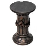 A reproduction column form composite stand decorated with garlands, height 51cm.