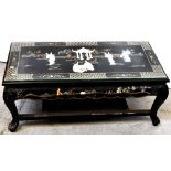 An early 20th century Oriental black lacquer coffee table,