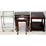 A nest of three mahogany tables on slender tapering cabriole supports to pad feet,