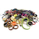 A large quantity of contemporary costume jewellery to include bead necklaces, pendants,