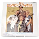 TV AND FILM, 'FAWLTY TOWERS'; a record bearing signatures to the sleeve of John Cleese,
