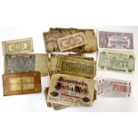 A collection of various world banknotes to include British Armed Forces Special £1 Voucher Second