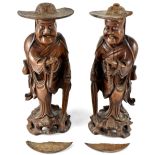 Two Japanese Meiji period carved figures of scholars, height of largest 35cm (2).