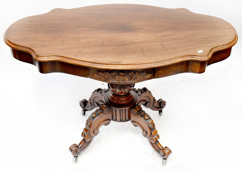 An late 19th century walnut centre table of small proportions,