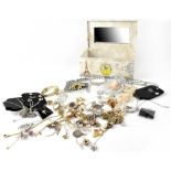 A jewellery box containing various items of costume jewellery to include a hallmarked 9ct gold