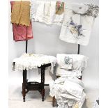 A large quantity of early/mid-20th century textiles, mainly linen table and bed ware,