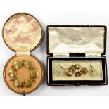 A cased set of six 18ct gold mounted circular studs with dimpled finish,