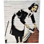 A Banksy style photographic block canvas print 'Sweep it Under the Carpet Maid', 103 x 80cm.