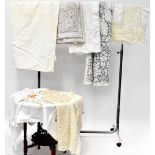 A large quantity of Edwardian and later textiles, to include lace work, crochet work,