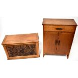 A handmade mahogany bedding box set with three dark wood carved panels of fruit and leaves,
