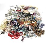 A large quantity of contemporary costume jewellery to include necklaces, glass bead necklaces,