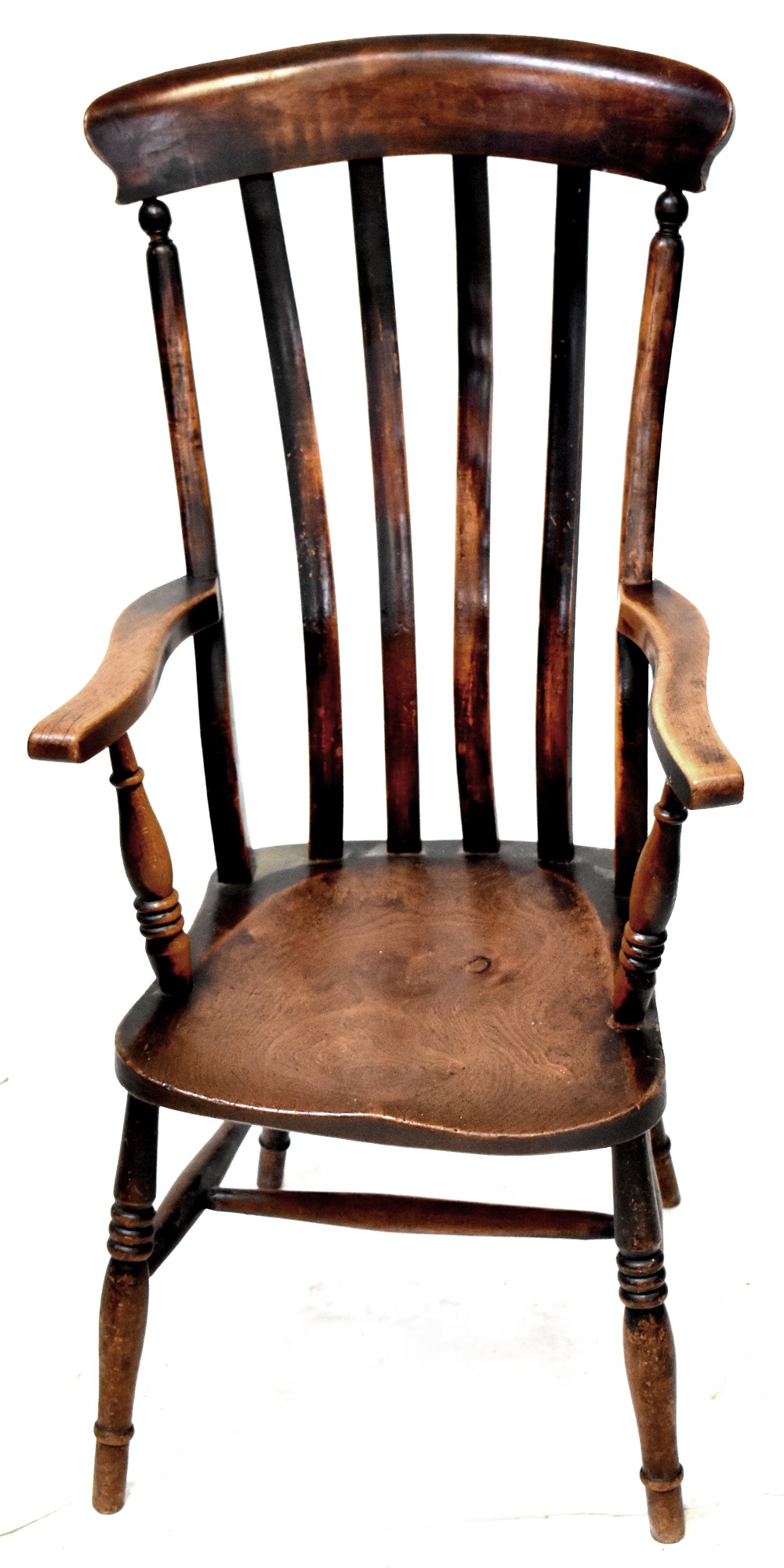 A 19th century provincial tall back Windsor chair with curved top rail, four-piece slat back,