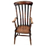 A 19th century provincial tall back Windsor chair with curved top rail, four-piece slat back,