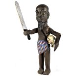 A large carved wooden North Nigerian figure with related provenance.