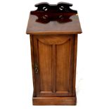 A 19th century mahogany pot cupboard with shaped top rail, on stepped plinth, 85 x 42 x 41cm.