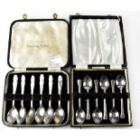 A cased set of six sterling silver teaspoons, with chased decoration to the finials,