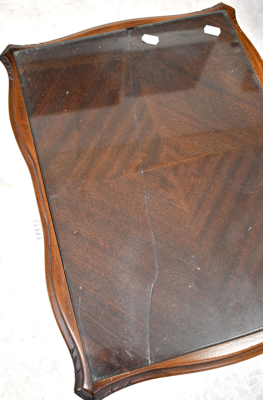 A nest of three mahogany tables on slender tapering cabriole supports to pad feet, - Image 2 of 2