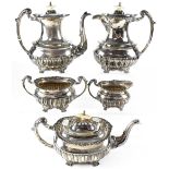 An Edward VII hallmarked silver five-piece tea service, teapot,