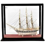 A fine and rare early 19th century prisoner of war bone model of a three-masted sailing ship with