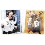 TV AND FILM, 'FAWLTY TOWERS'; four photographs bearing signatures including John Cleese,