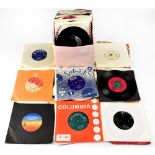 Approximately fifty vinyl singles to include The Beach Boys, Bob Dylan, Buddy Holly, The Who,