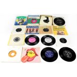 Approximately thirty vinyl singles to include The Rolling Stones, The Kinks, The Monkees,