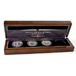 A Bradford Exchange 'Longest Reigning Monarch 925 Silver Crown Set' comprising three of the four