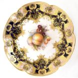 ROYAL WORCESTER; a bowl with lobed rim decorated by Richard Sebright,