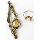 A late 19th century 9ct gold cameo ring, size P and a ladies' 9ct gold Accurist wristwatch,