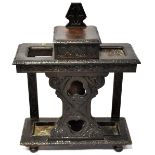 A 19th century profusely carved oak stick stand,