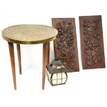 A small brass-topped Middle Eastern side table with later added tapered legs, height 39cm,