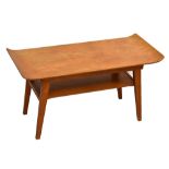 A 1950s oak coffee table with curved ends and undertier magazine shelf, length 82cm, depth 38.5cm,
