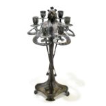 AFTER ROMAIN DE TIRTOFF 'ERTE'; a modern Art Nouveau style bronze six-branch figural candelabrum