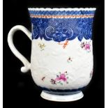 An 18th century Chinese Famille Rose porcelain mug of baluster form, with ruyi-head in floral