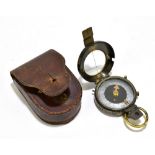 A leather cased military compass, unmarked, glass (af).Additional InformationGlass cracked,