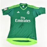 IKER CASILLAS; an Adidas C. F. Real Madrid goalkeeper’s shirt signed to front, size XS.  Additional