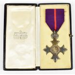 A military hallmarked silver OBE medal, unnamed as issued, in fitted Garrard & Co case with gilt