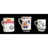 Three 18th century Chinese Famille Rose porcelain mugs including a cylindrical example, the