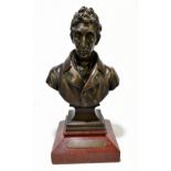 A 19th century French bronze bust of Mathieu de Dombasle, on rouge marble base with attached