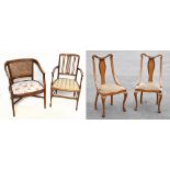 An Edwardian line inlaid mahogany armchair raised on spade feet, together with a pair of early