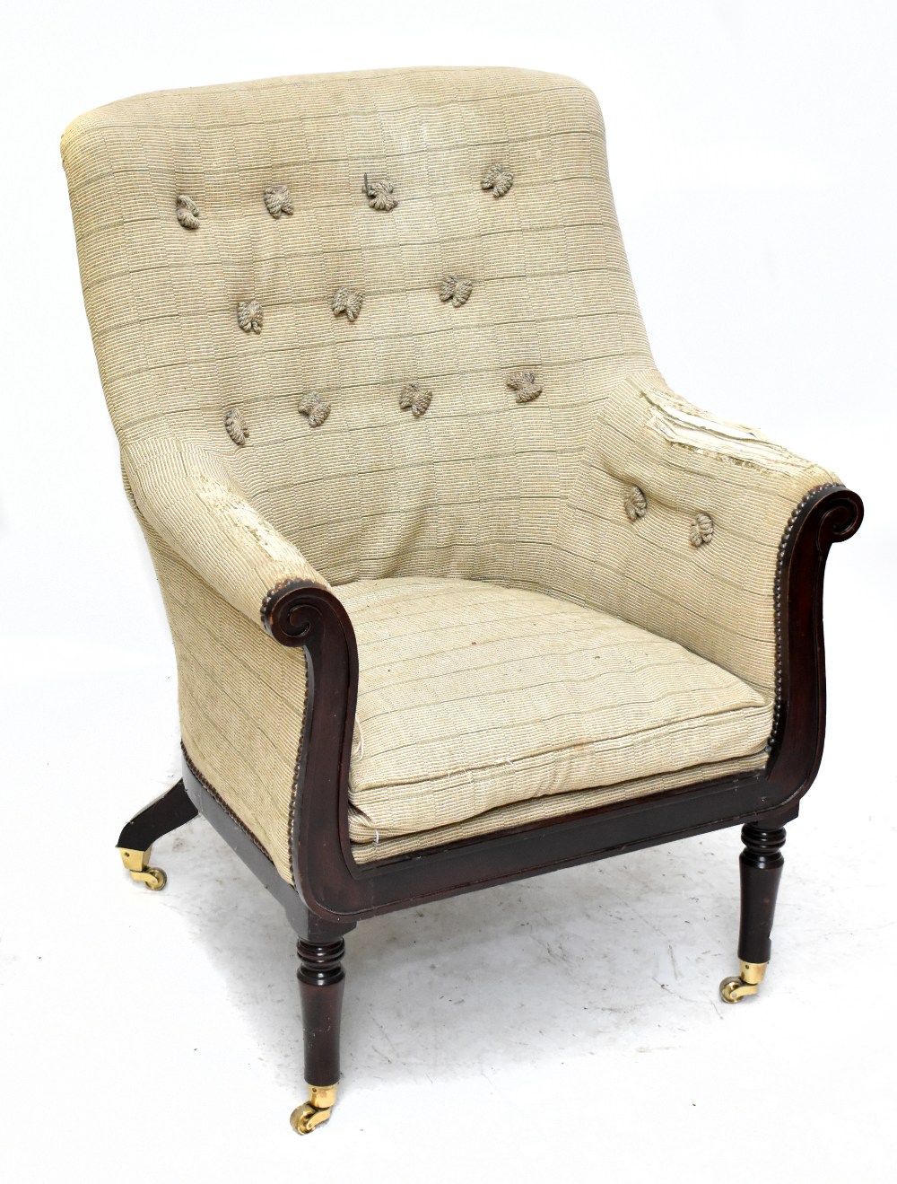 A Georgian style mahogany framed armchair upholstered in a striped button back material raised on
